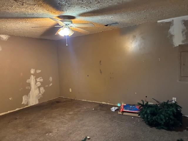 spare room featuring a textured ceiling