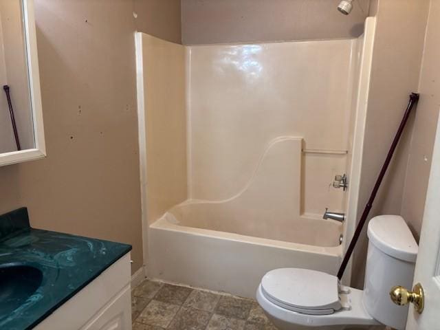 full bathroom featuring shower / tub combination, vanity, and toilet