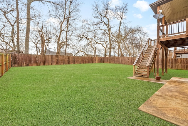 view of yard with a patio area and a deck