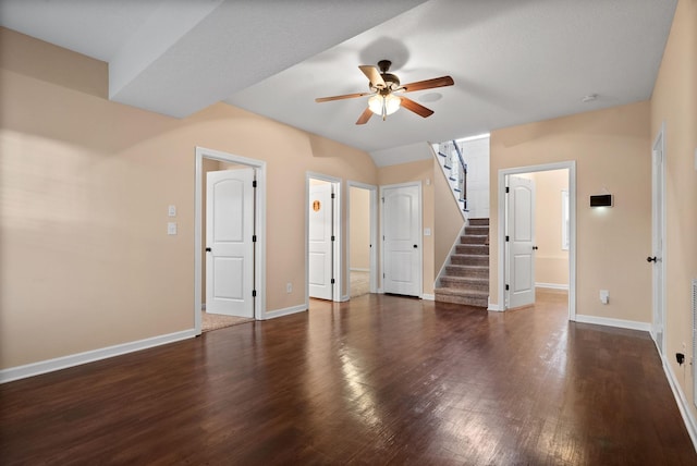 unfurnished room with dark wood-type flooring and ceiling fan