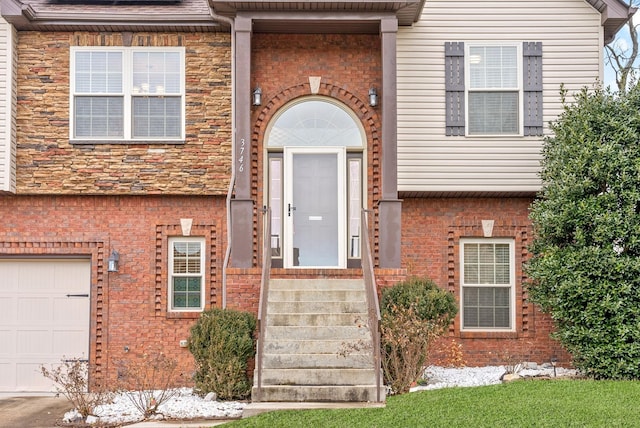 entrance to property with a garage