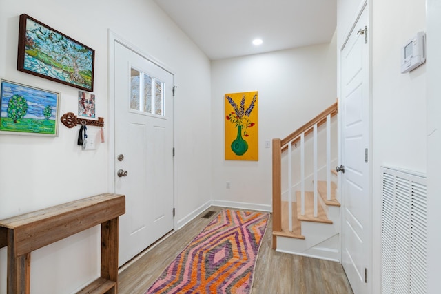 entrance foyer with light wood-type flooring