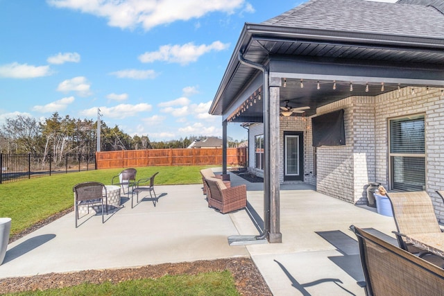 view of patio with an outdoor living space and ceiling fan