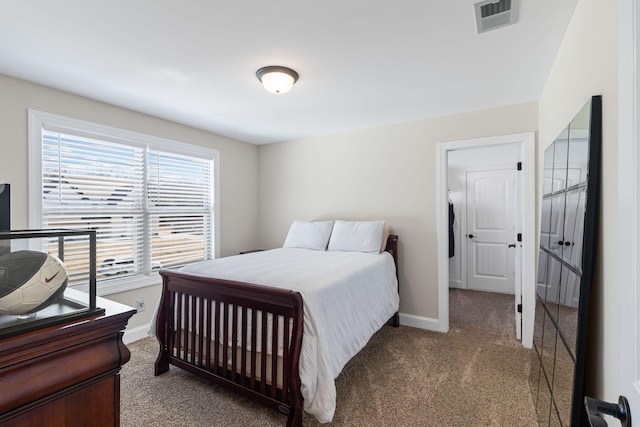 bedroom featuring light carpet