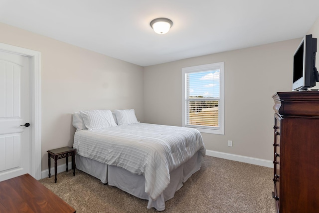 bedroom with light colored carpet