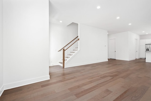 unfurnished living room featuring light wood-type flooring