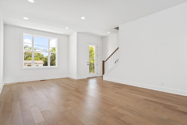 interior space with a wealth of natural light and light wood-type flooring