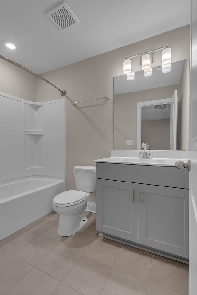 full bathroom featuring tile patterned flooring, vanity,  shower combination, and toilet