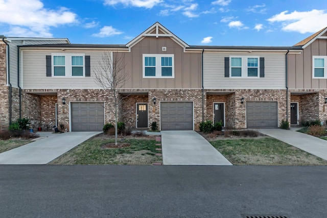 multi unit property featuring a garage