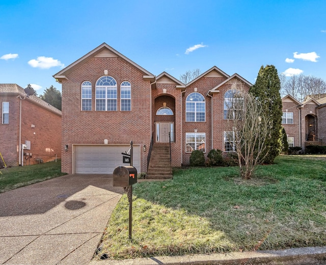 view of property featuring a garage and a front yard