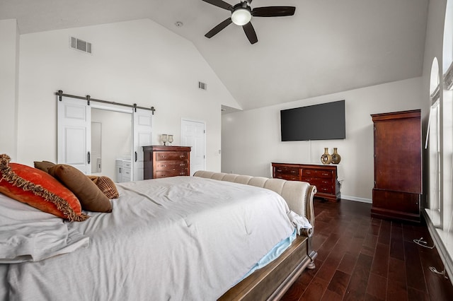 bedroom with ceiling fan, a barn door, high vaulted ceiling, and dark hardwood / wood-style flooring