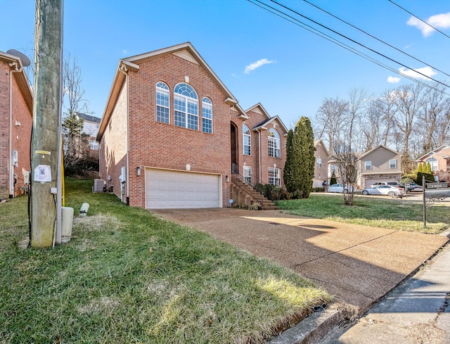 view of front of home featuring a garage and a front lawn