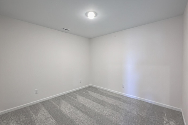 empty room with carpet flooring