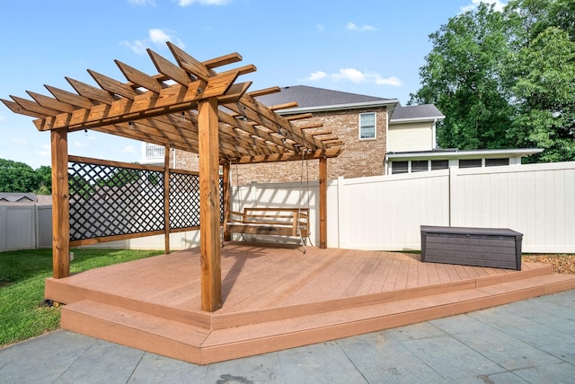 deck with fence private yard and a pergola