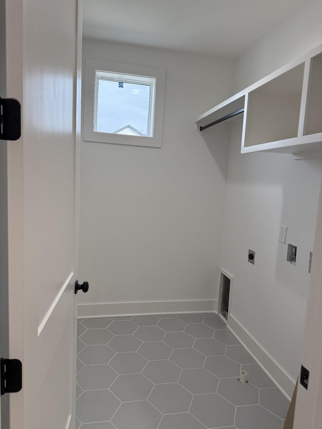 laundry area featuring electric dryer hookup