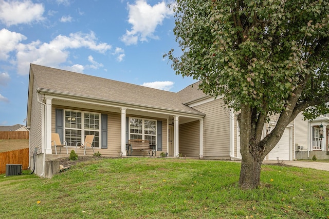 view of front of property with a porch, central AC unit, and a front yard