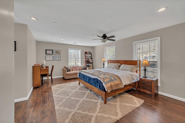 bedroom featuring dark wood-type flooring and ceiling fan