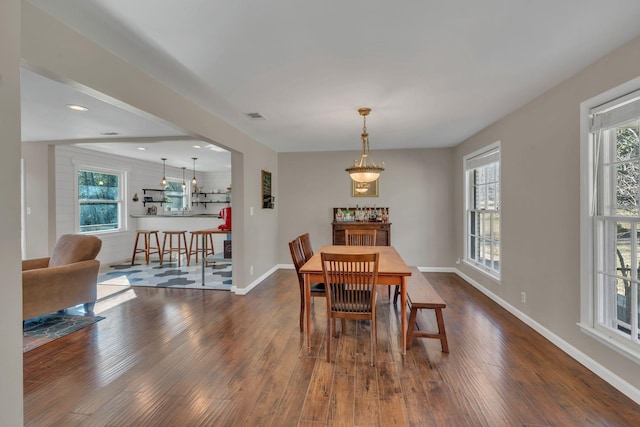 dining area featuring dark hardwood / wood-style flooring