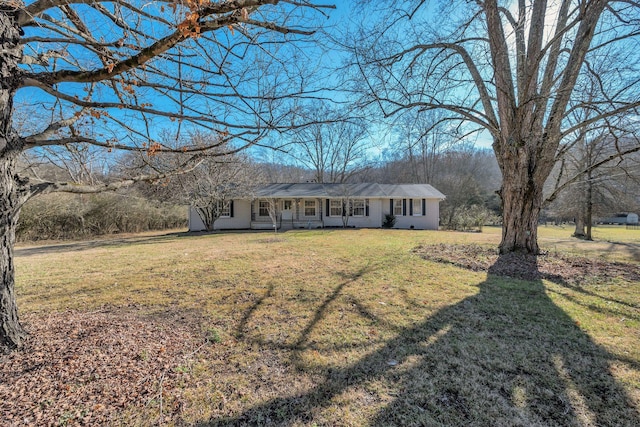 ranch-style house with a front lawn