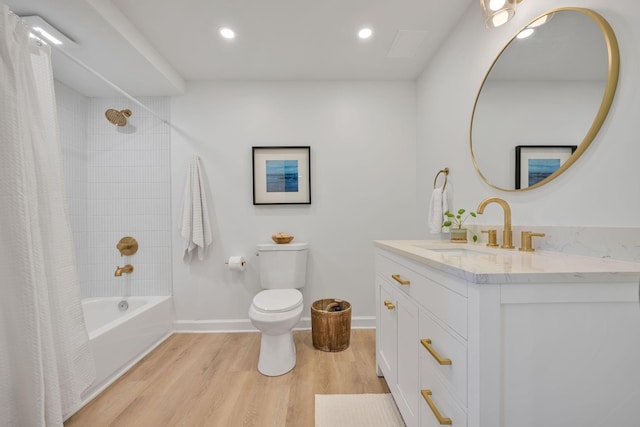 full bathroom featuring shower / tub combo, vanity, toilet, and hardwood / wood-style floors