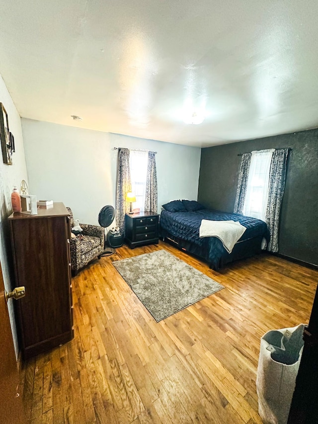 bedroom featuring hardwood / wood-style flooring