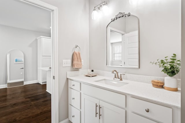 bathroom featuring vanity and hardwood / wood-style floors