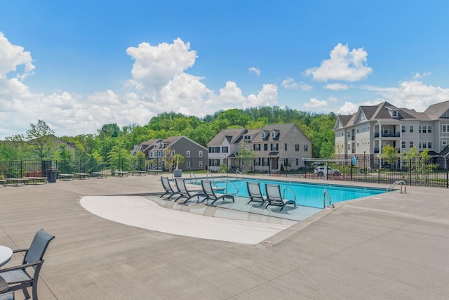 view of pool featuring a patio