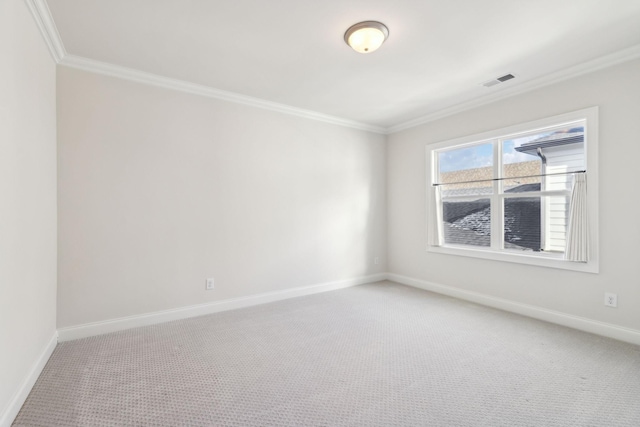 carpeted empty room with ornamental molding