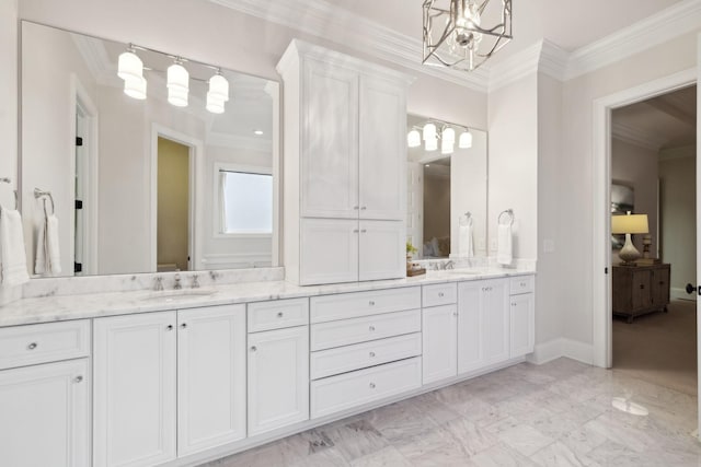 bathroom featuring ornamental molding and vanity