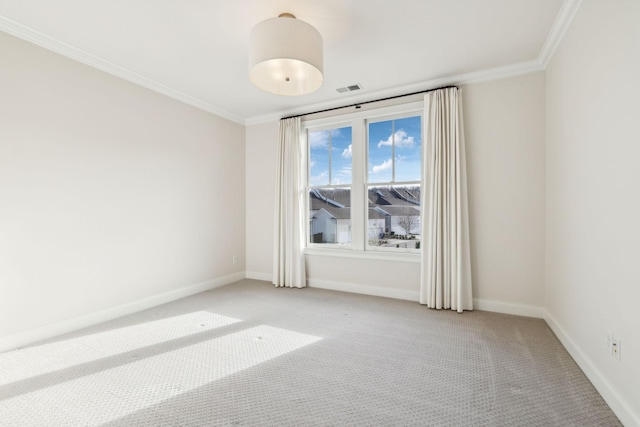 carpeted empty room with crown molding