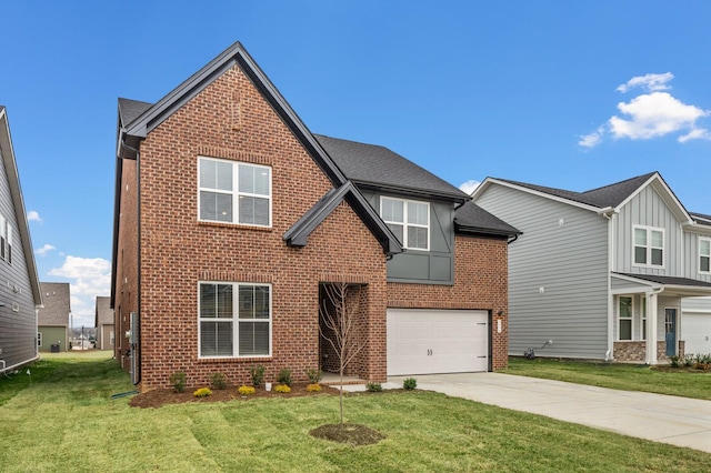 view of front of property with a garage and a front yard