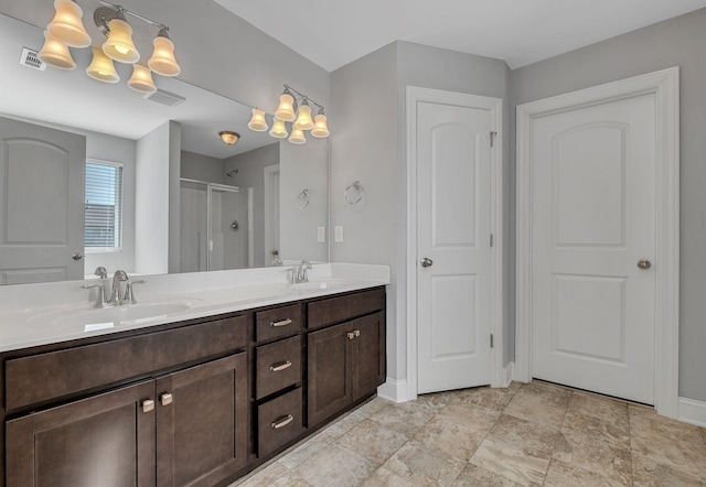 bathroom with vanity and walk in shower