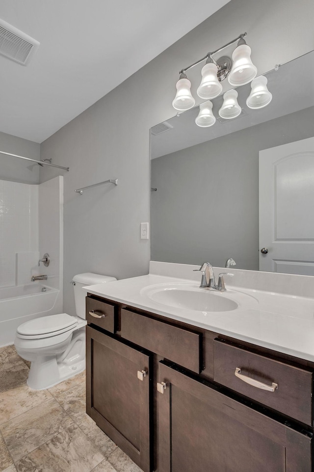 full bathroom with vanity, washtub / shower combination, and toilet