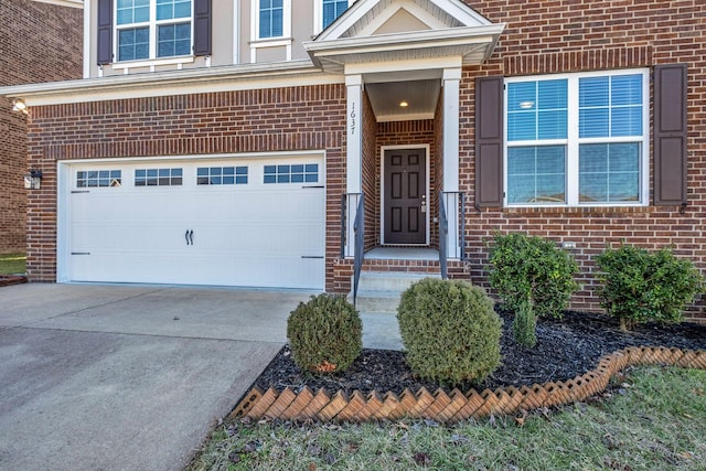 entrance to property featuring a garage