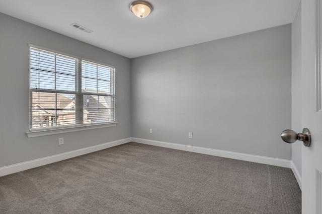 empty room featuring carpet