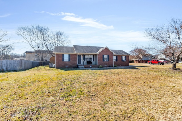 single story home featuring a front lawn