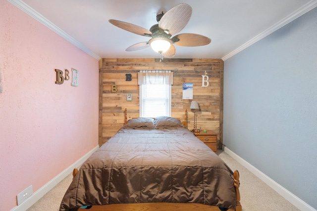 bedroom featuring crown molding, wooden walls, ceiling fan, and carpet