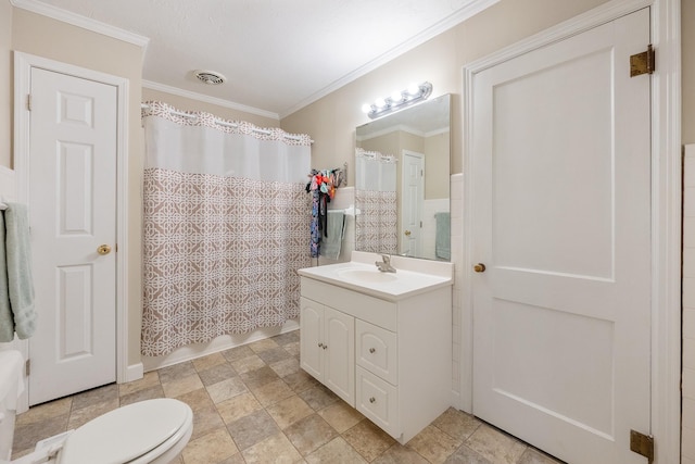 full bathroom with vanity, shower / tub combo with curtain, crown molding, and toilet