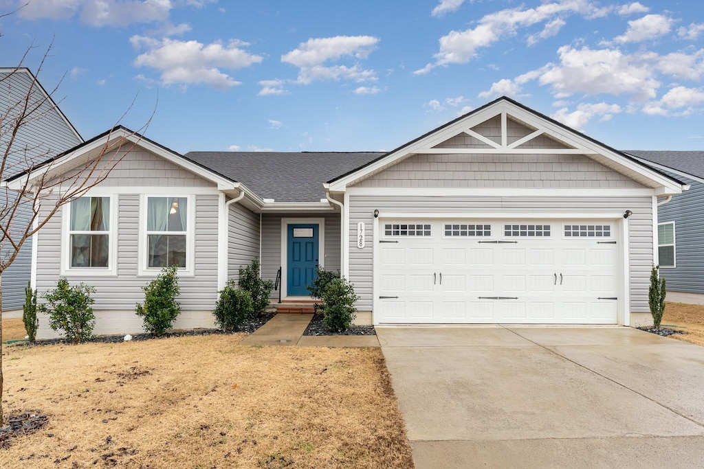 view of front of home with a garage