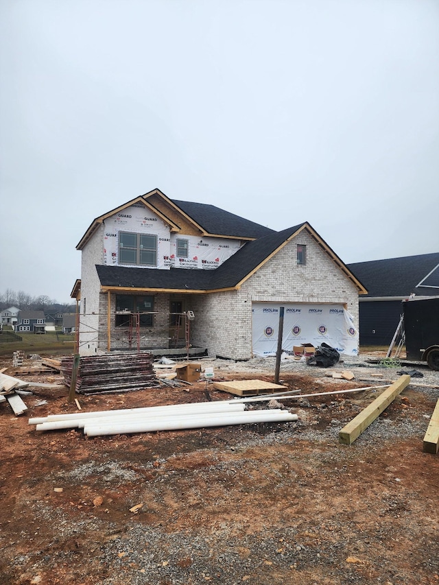 property in mid-construction featuring a garage