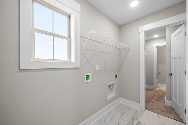 washroom with hookup for a washing machine, hookup for an electric dryer, laundry area, baseboards, and marble finish floor