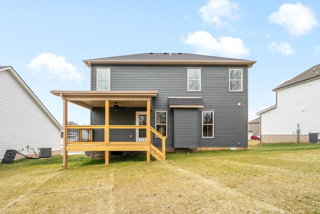 back of property featuring a yard, crawl space, central AC, and a ceiling fan