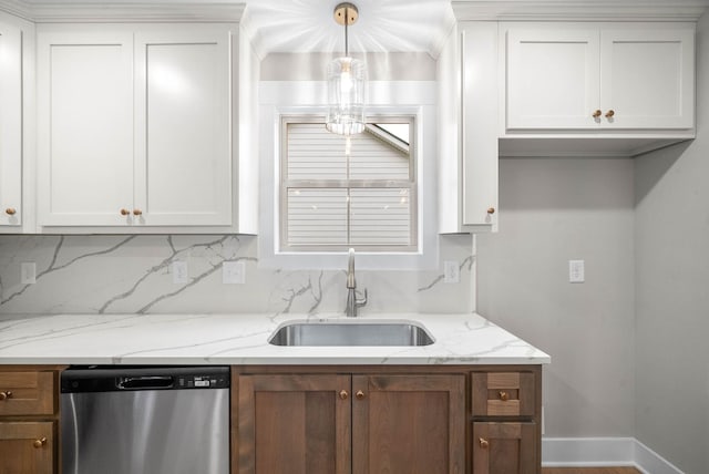 kitchen with white cabinets, dishwasher, hanging light fixtures, light stone countertops, and a sink