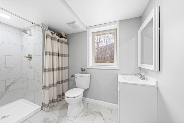 bathroom featuring vanity, curtained shower, and toilet