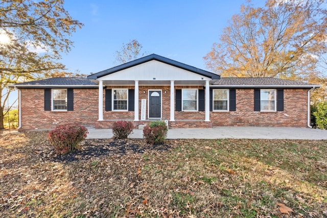 ranch-style home with a front lawn