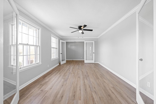 unfurnished room with ceiling fan, ornamental molding, and light hardwood / wood-style flooring