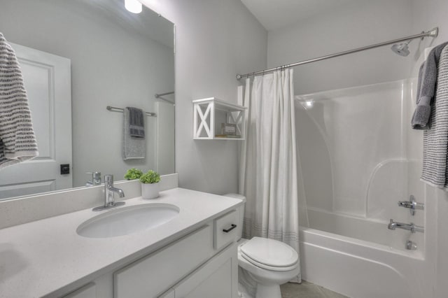 full bathroom featuring shower / tub combo with curtain, vanity, and toilet