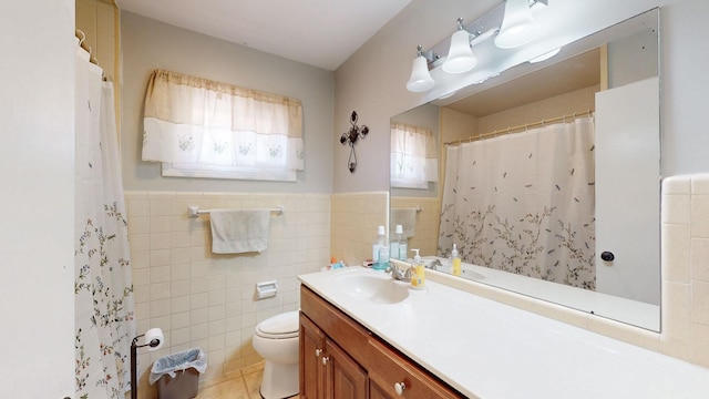 bathroom featuring tile walls, vanity, a shower with curtain, tile patterned floors, and toilet