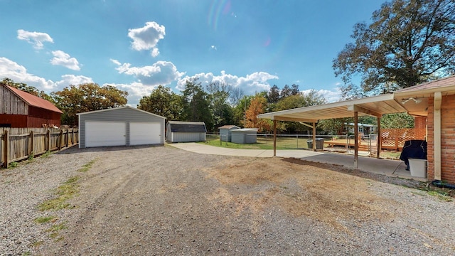 exterior space with a garage and a shed