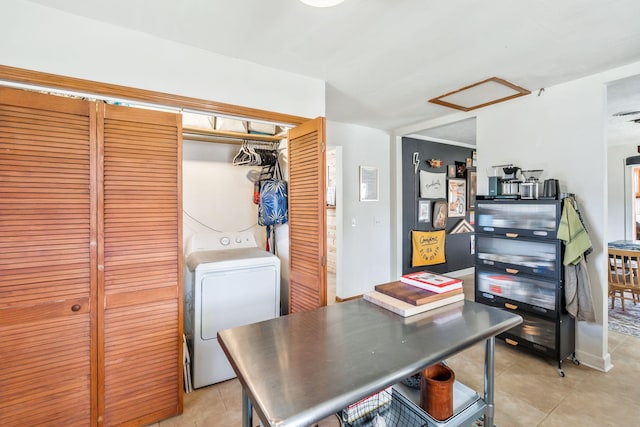 office space with light tile patterned flooring and washer / clothes dryer